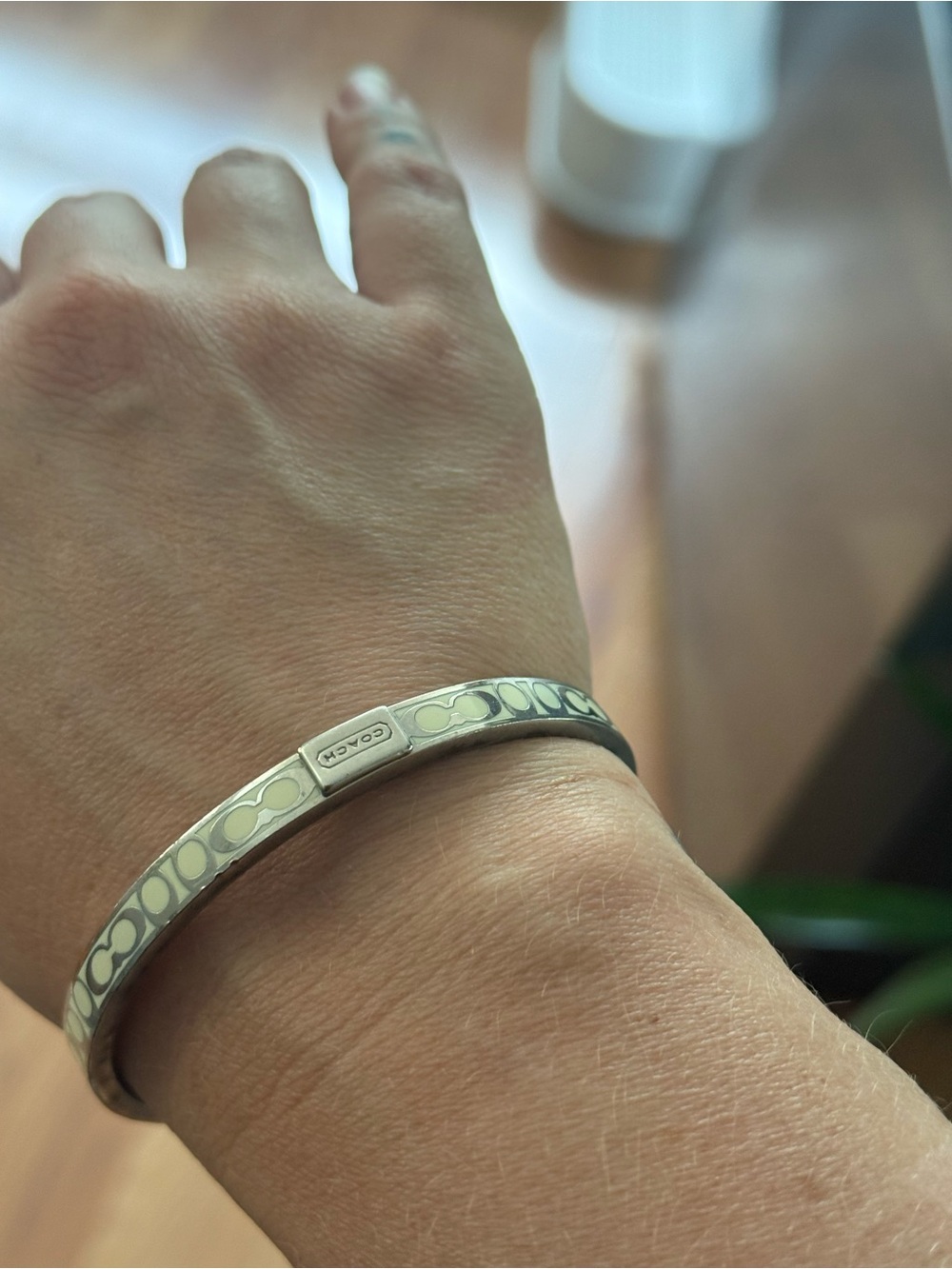 White and silver coach bangle